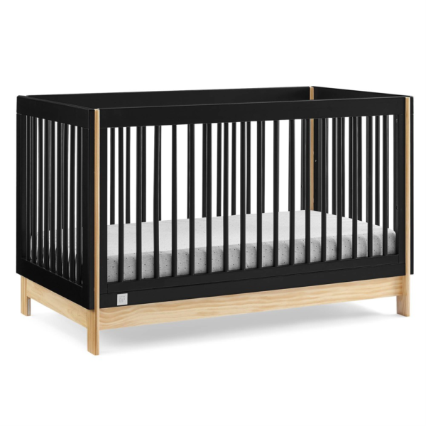 The babyGap by Delta Children Tate 4-in-1 Convertible Crib is a modern crib with natural accents on the base and corner posts. Crafted of sturdy, sustainable materials like New Zealand pine, this crib is the best choice for babies (and the planet!). Thoughtfully made to grow with your little one, the crib?s adjustable mattress support allows you to lower the mattress height as your baby grows. When your child is ready, its versatile design easily adapts from crib to a cozy toddler bed, daybed and sofa (conversion rail #W173726 sold separately). Plus, it?s GREENGUARD Gold Certified, which means it?s built to contribute to cleaner air for a healthy home. Available in Bianca White/Natural, Navy/Natural and Ebony/Natural. Easily mix, match, and layer with other items from the babyGap Furniture and Bedding Collection. Gap?s first-ever baby furniture collection reimagines timeless American style for modern nurseries and kids? bedrooms. Discover quality designs and go-to essentials that instantly refreshing.